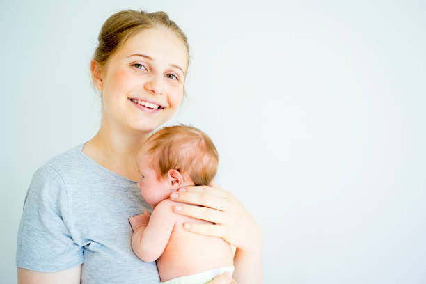 istock Mother with her baby 885577266