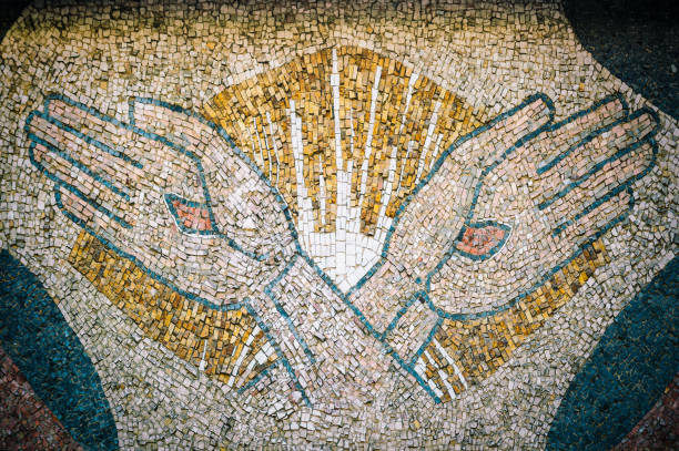 Male hand painted white gesturing isolated on light studio background. Concept of contemporary art, beauty, creativity, diversity, care, support and ad. Symbolism. Copy space for ad