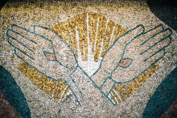 Photo of Mosaic tile Crucified hands of Jesus,