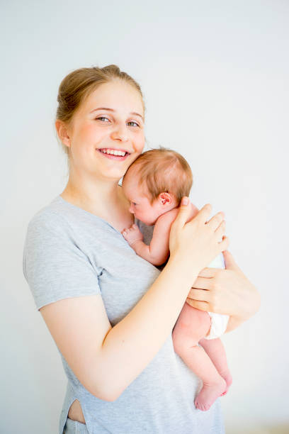 istock Mother with her baby 885577472