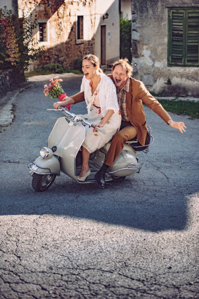 istock Joyful  Couple Explore Old Village On   Scooter 885591900