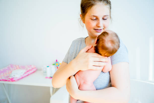 istock Mother with her baby 885592132