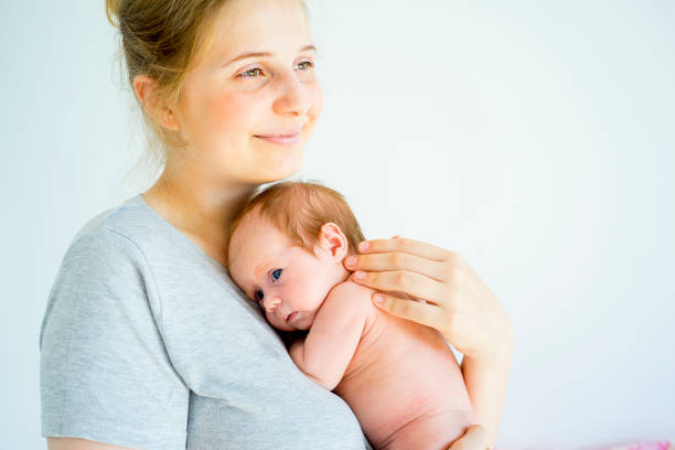 istock Mother with her baby 885592388