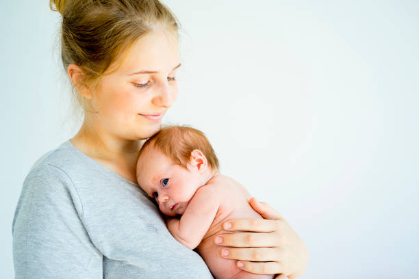 istock Mother with her baby 885592572