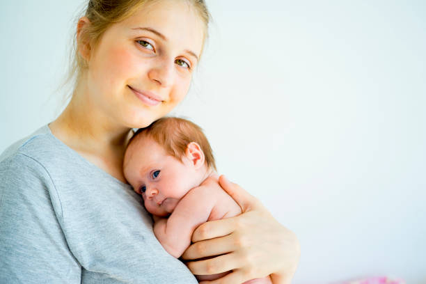 istock Mother with her baby 885592738