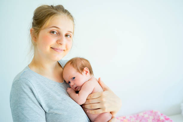 istock Mother with her baby 885599880