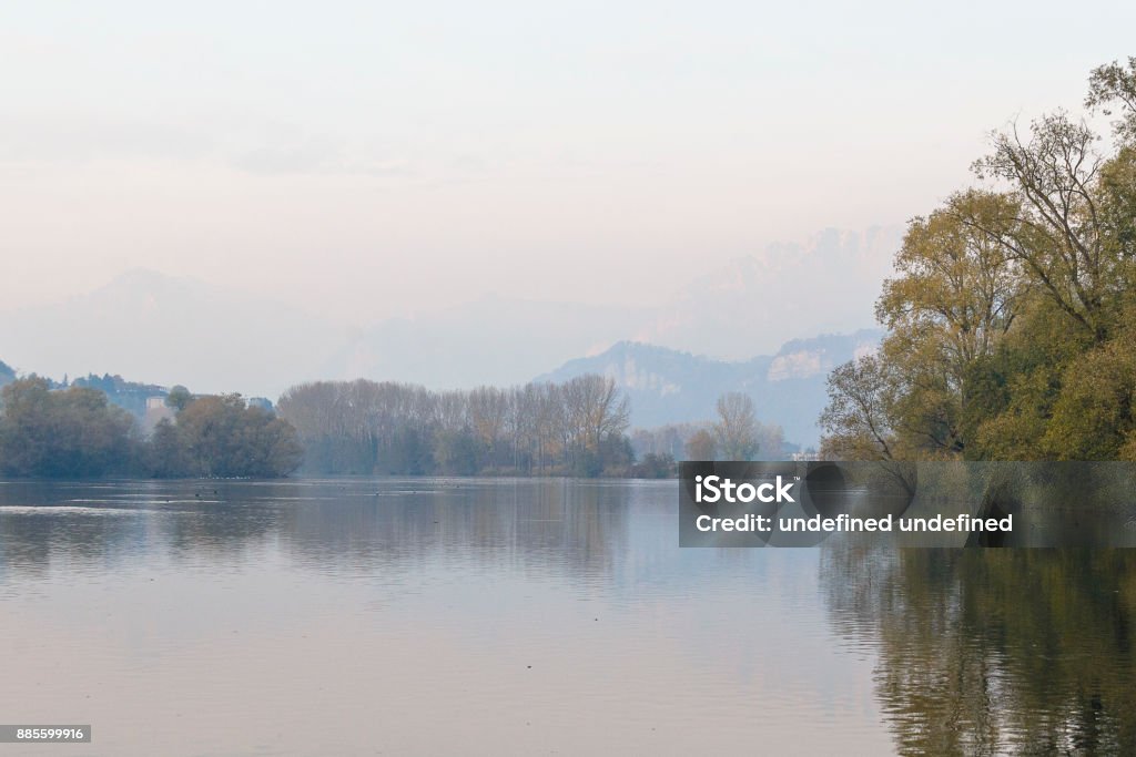 views of the Adda River a sunset on a boat on the Adda River water  in Imbersago Autumn Stock Photo