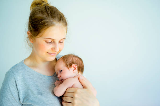 istock Mother with her baby 885599998