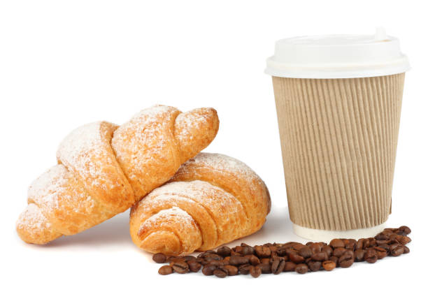 istock fresh croissant with coffee isolated on white background 885606466