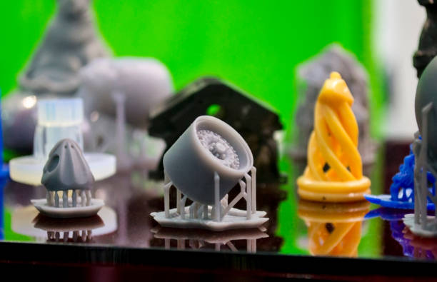 Objects photopolymer printed on a 3d printer. Objects photopolymer printed on stereolithography 3D printer, technology of liquid photopolymerization under UV light. Progressive modern additive technology. 3d printing filament photos stock pictures, royalty-free photos & images
