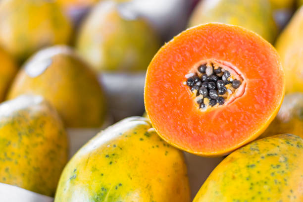 Papayas exposed for sale in agricultural fair stalls stock photo