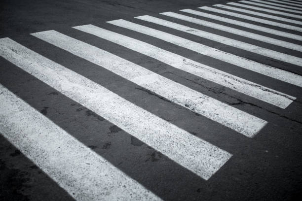 Nobody on Crosswalk in Black and white Crosswalk Nobody on Crosswalk in Black and white Crosswalk Darck Tone pavement ends sign stock pictures, royalty-free photos & images
