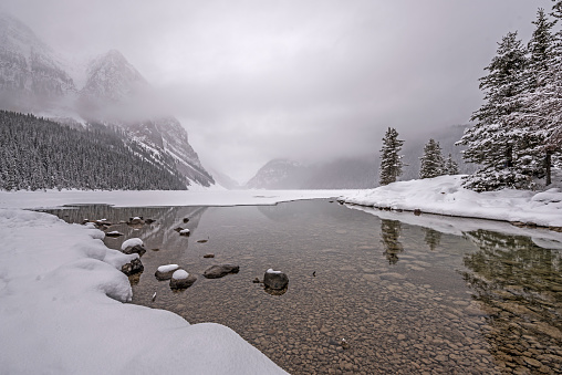 snow falling on Lake Louise in Banff National Park
