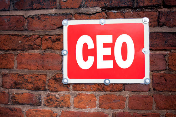 istock Hand writing text caption inspiration showing CEO concept meaning Operating Leader Business Executive President written on old announcement road sign with background and copy space 885687518