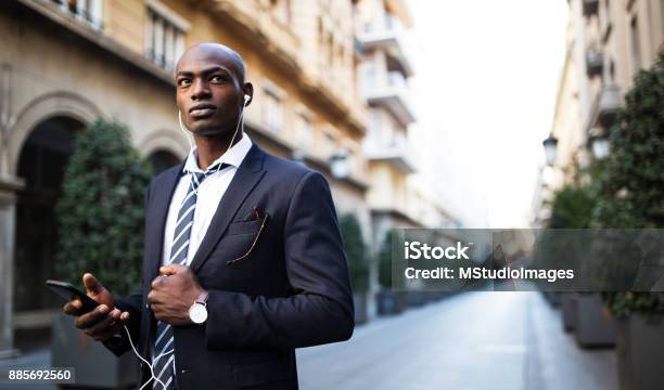 Serious African Businessman Stock Photo - Download Image Now - Nigeria, Business, City