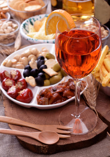 Tray and bowls with appetizers and snacks on the table
