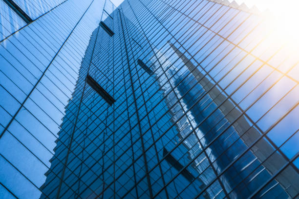 istock Low angle view of modern metallic skyscrapers 885734956