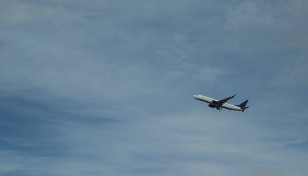 istock Airplane in the sky and cloud 885747048