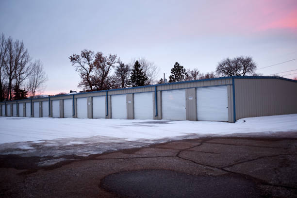 istock Row of garages in winter snow at sunset 885771820