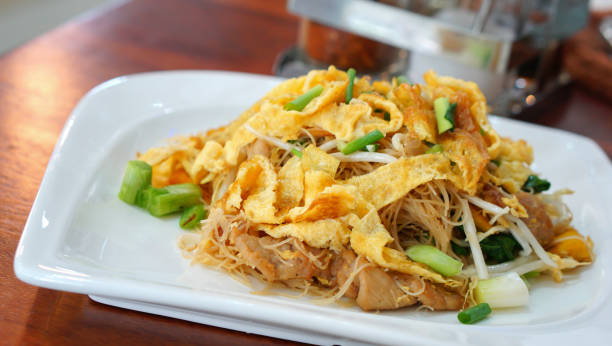 istock Stir-fried noodle with egg meat and vegetable 885784186