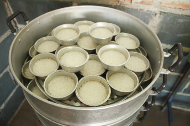 istock Jasmine rice cooking to feed people 885796692