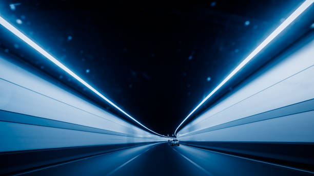 istock Motion blurred car in tunnel 885824694