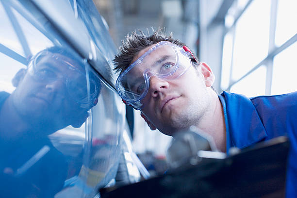 técnico de inspección - vehículo de motor fotografías e imágenes de stock