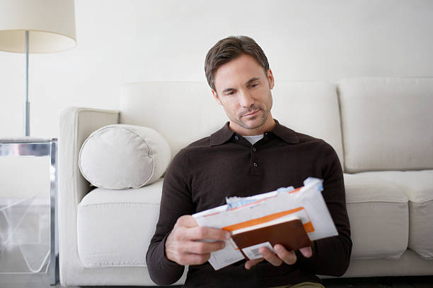 190+ Man Sorting Mail At Home Stock Photos, Pictures & Royalty-Free ...