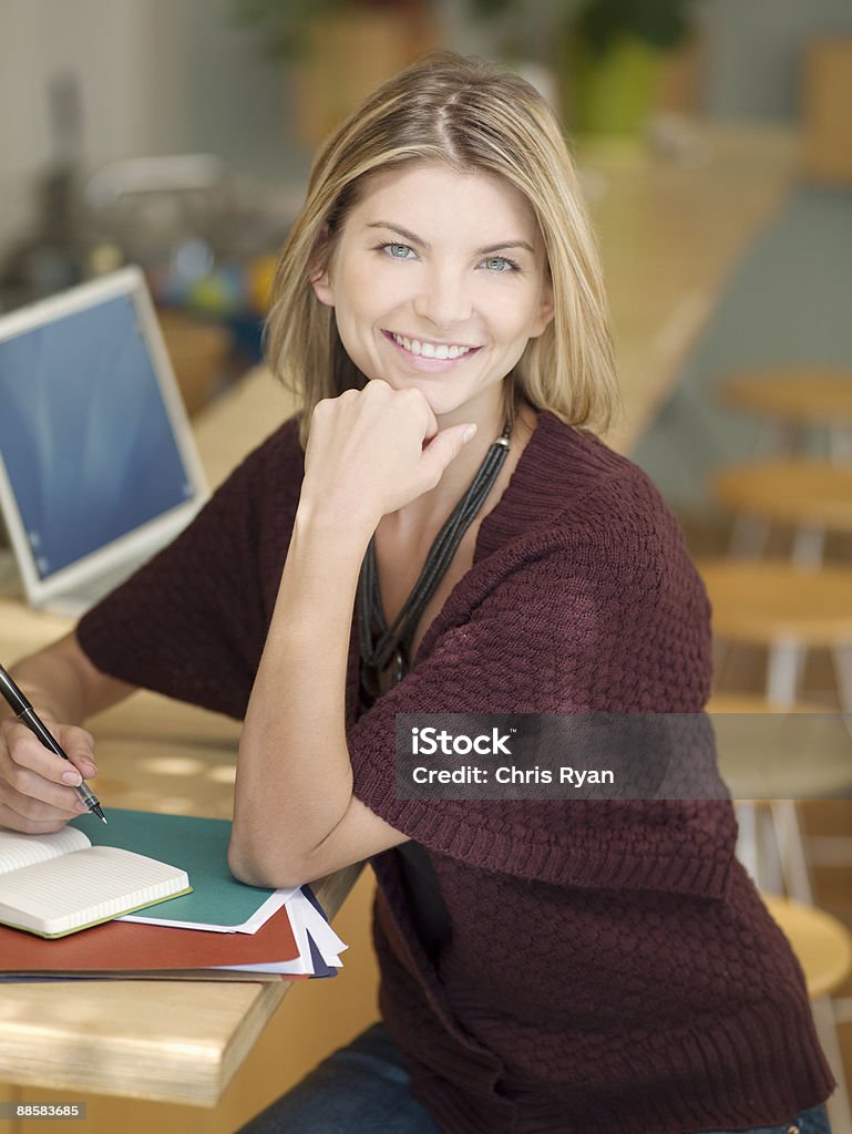 Woman working from home  Pen Stock Photo