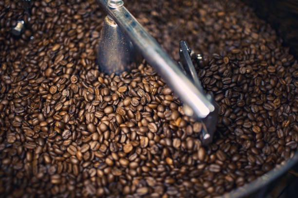 istock Freshly Roasted Coffee Beans in Mixer 885838654