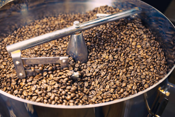 istock Freshly Roasted Coffee Beans in Mixer 885838674