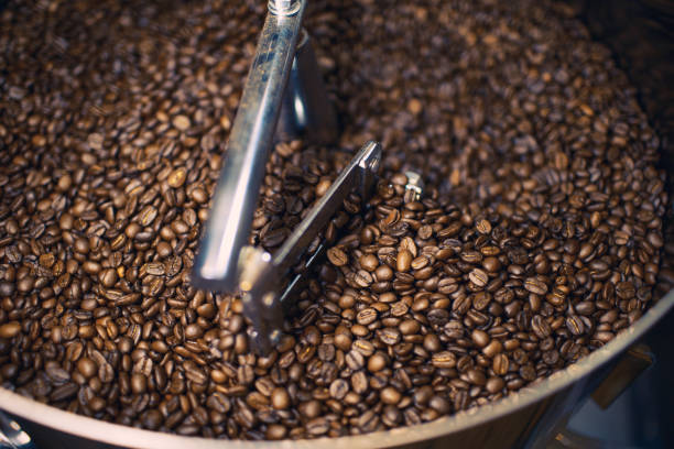 istock Freshly Roasted Coffee Beans in Mixer 885838824