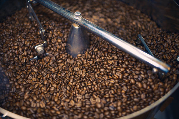 istock Freshly Roasted Coffee Beans in Mixer 885838862