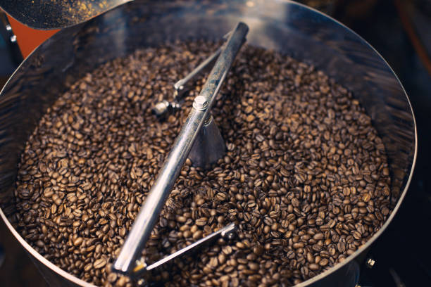 istock Freshly Roasted Coffee Beans in Mixer 885838872