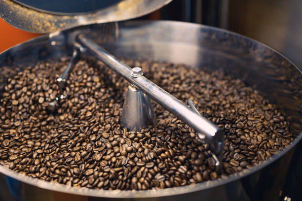istock Freshly Roasted Coffee Beans in Mixer 885838958