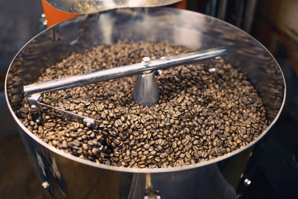 istock Freshly Roasted Coffee Beans in Mixer 885838990