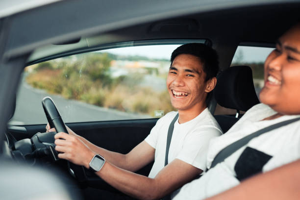 istock Two male friends having a conversation in the car 885844672