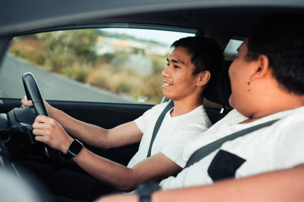 istock Two male friends having a conversation in the car 885844698