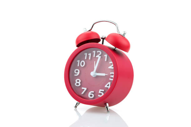 istock Red alarm clock isolated on white background. 885884588