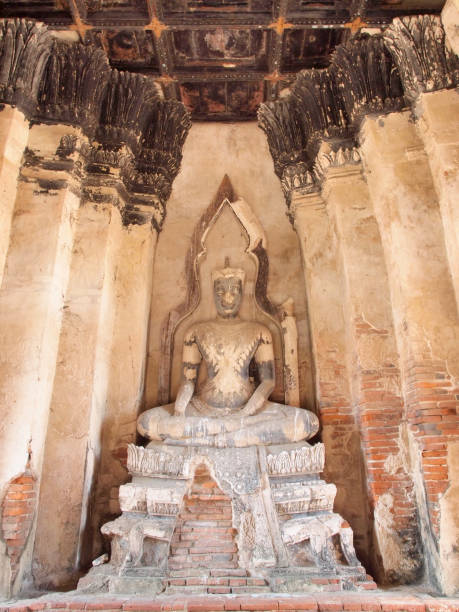 istock Old Buddha in Ayutthaya, Thailand 885886308