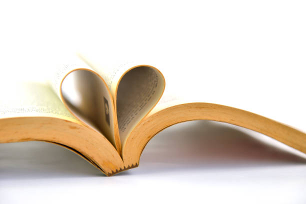 istock Book heart isolated on white background 885887062