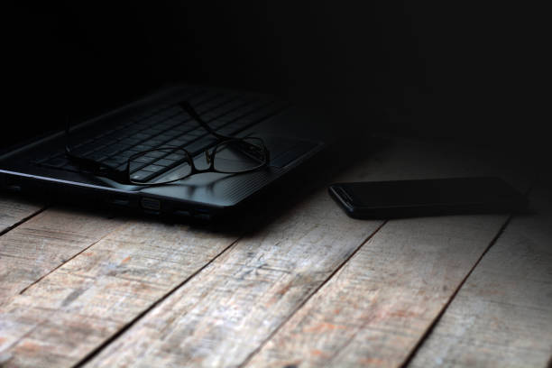 istock Desk in the dark 885892390