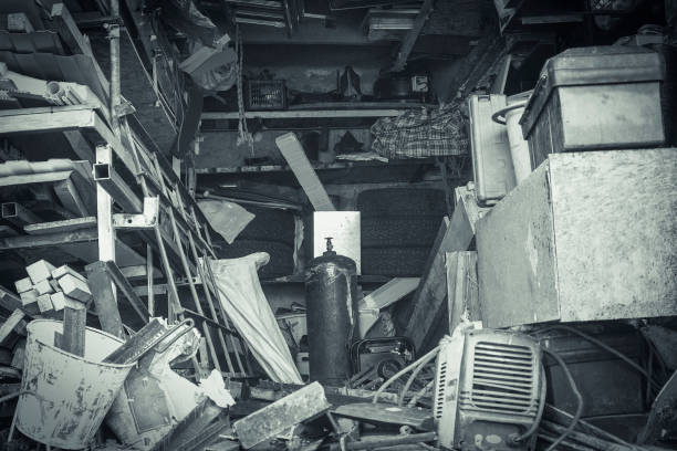 istock Big mess in an over stuffed suburban garage. 885899580
