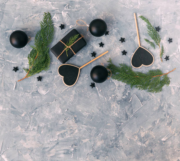 istock Christmas black ball with decorations over vintage background 885914428