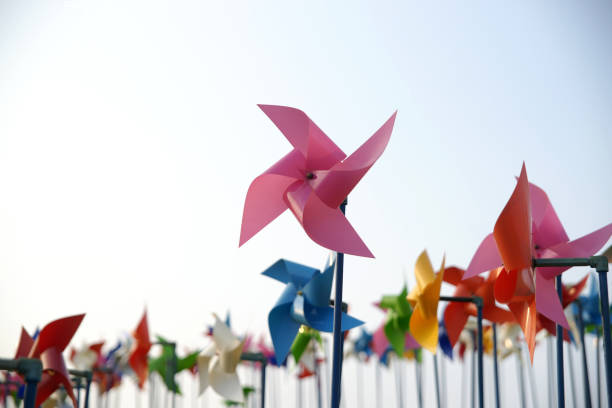 istock Colorful paper windmill pinwheels 885919568