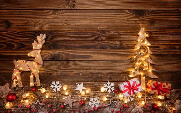 istock Christmas background with wooden decorations,moose and tree 885936144