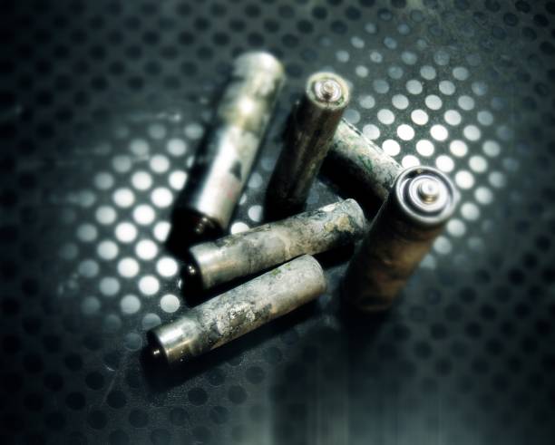 istock Corrosion reaction on the old batteries soft focus 885944094