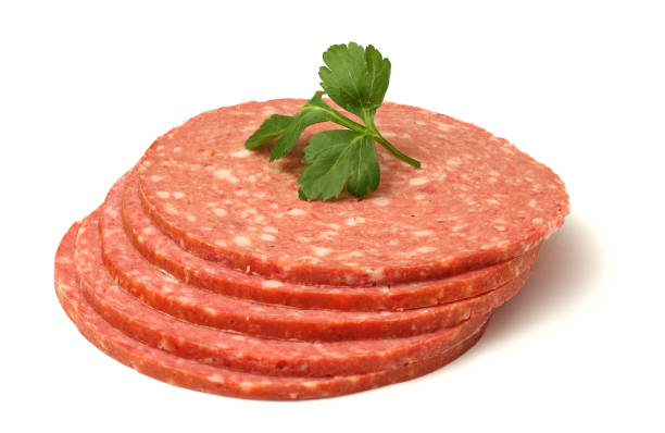 istock sliced red salami isolated on white background 885949014