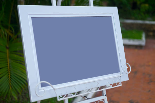 istock White wood picture blank frame in wedding day 885956390