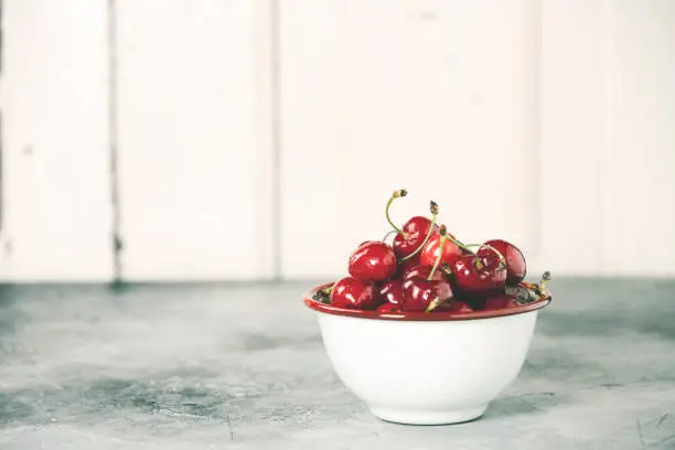 Photo of Fresh cherries in bowl